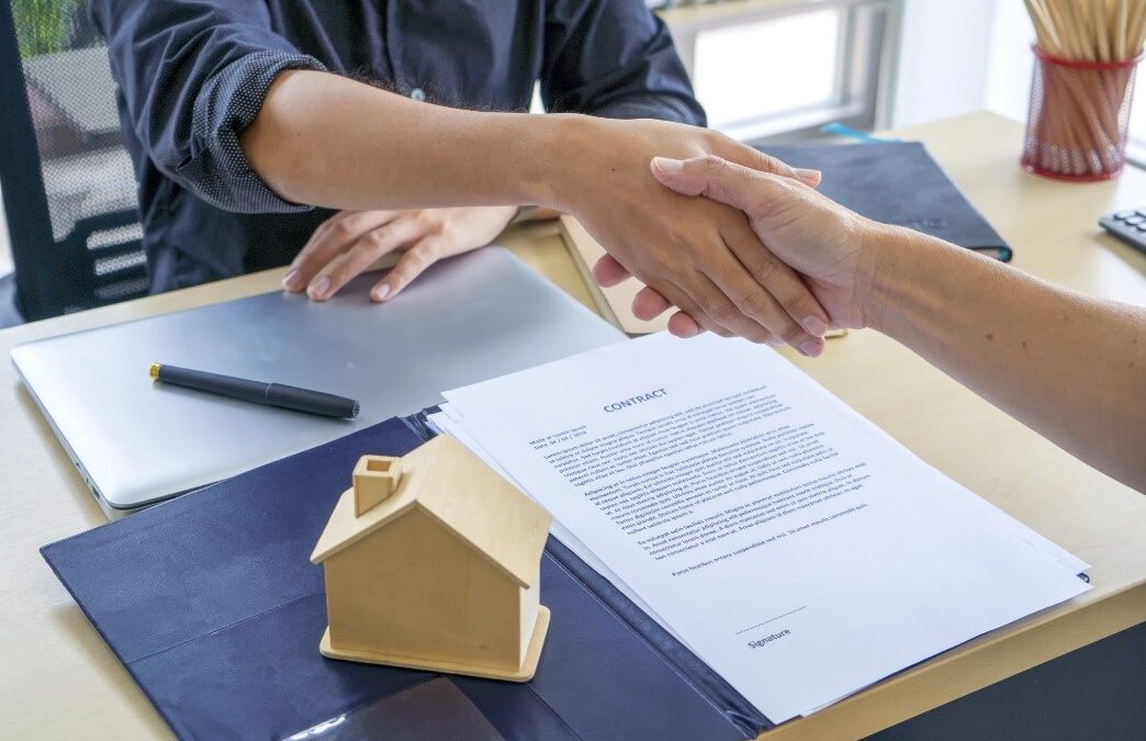 An attorney and a client shaking hands | Real Estate Litigation Attorney